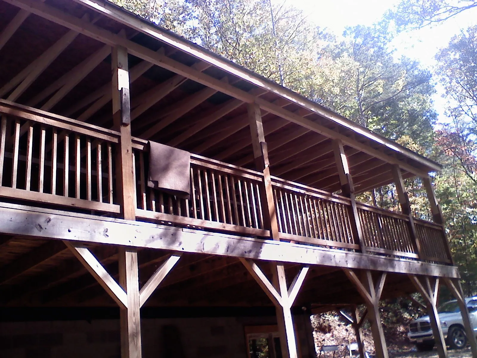 Timber framing under a new elevated porch and deck — Roof Leak Repair in Amelia by Roofing Brothers